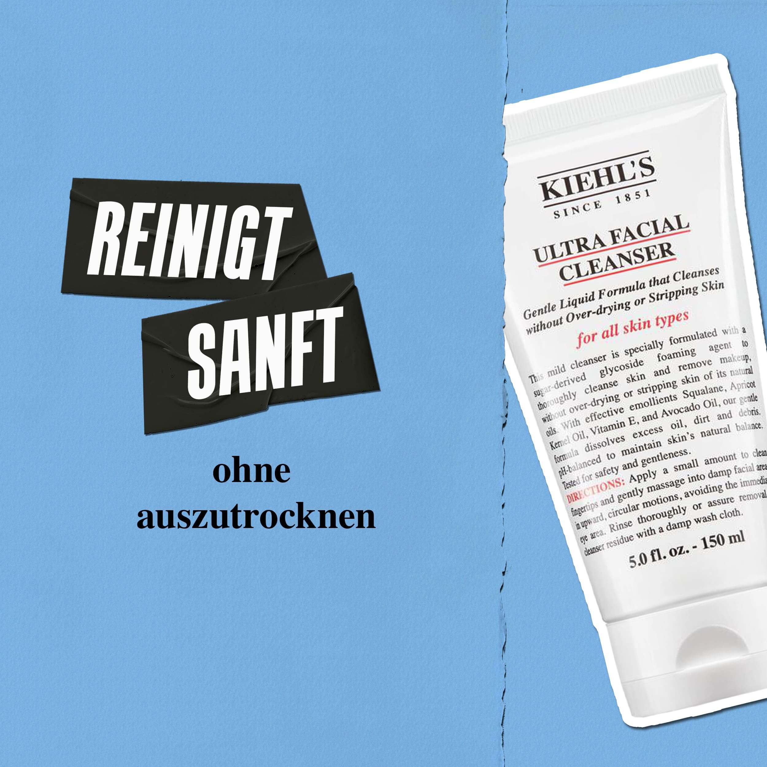 Model halt eine Tube des Kiehl's Ultra Facial Cleanser