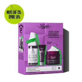 Kiehl's "Age-Less Experts" anti-aging skincare set, featuring a retinol serum, eye cream, and multi-corrective cream.