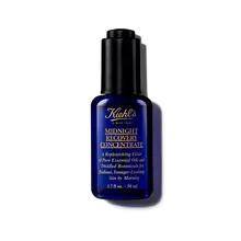 Un flacon de 30 ml d'huile pour le visage Midnight Recovery Concentrate de Kiehl's sur fond blanc.