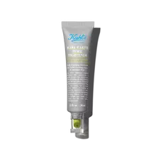 A tube of Kiehl’s Rare Earth Pore Tightening Treatment. The tube is grey with a green applicator and a clear cap.