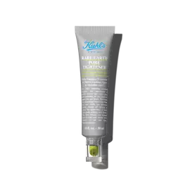 A tube of Kiehl’s Rare Earth Pore Tightening Treatment. The tube is grey with a green applicator and a clear cap.