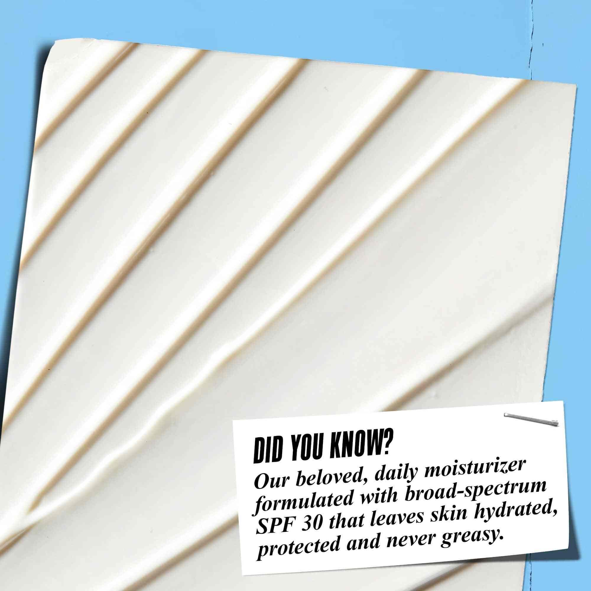 Nahaufnahme der Textur von Ultra Facial Cream SPF 30 mit dem Text: „Wussten Sie schon? Unsere beliebte tagliche Feuchtigkeitscreme mit Breitband-LSF 30, die die Haut mit Feuchtigkeit versorgt, schutzt und niemals fettig macht.“