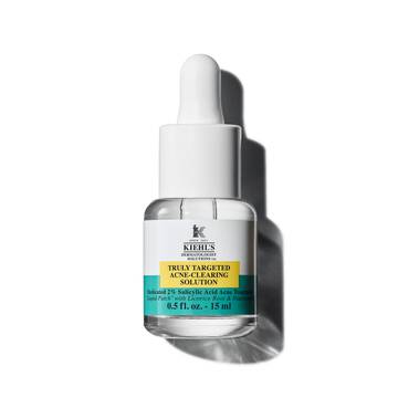 Un flacon de 15 ml de la solution Truly-Targeted Blemish-Clearing Solution de Kiehl's sur fond blanc.