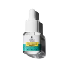 Un flacon de 15 ml de la solution Truly-Targeted Blemish-Clearing Solution de Kiehl's sur fond blanc.