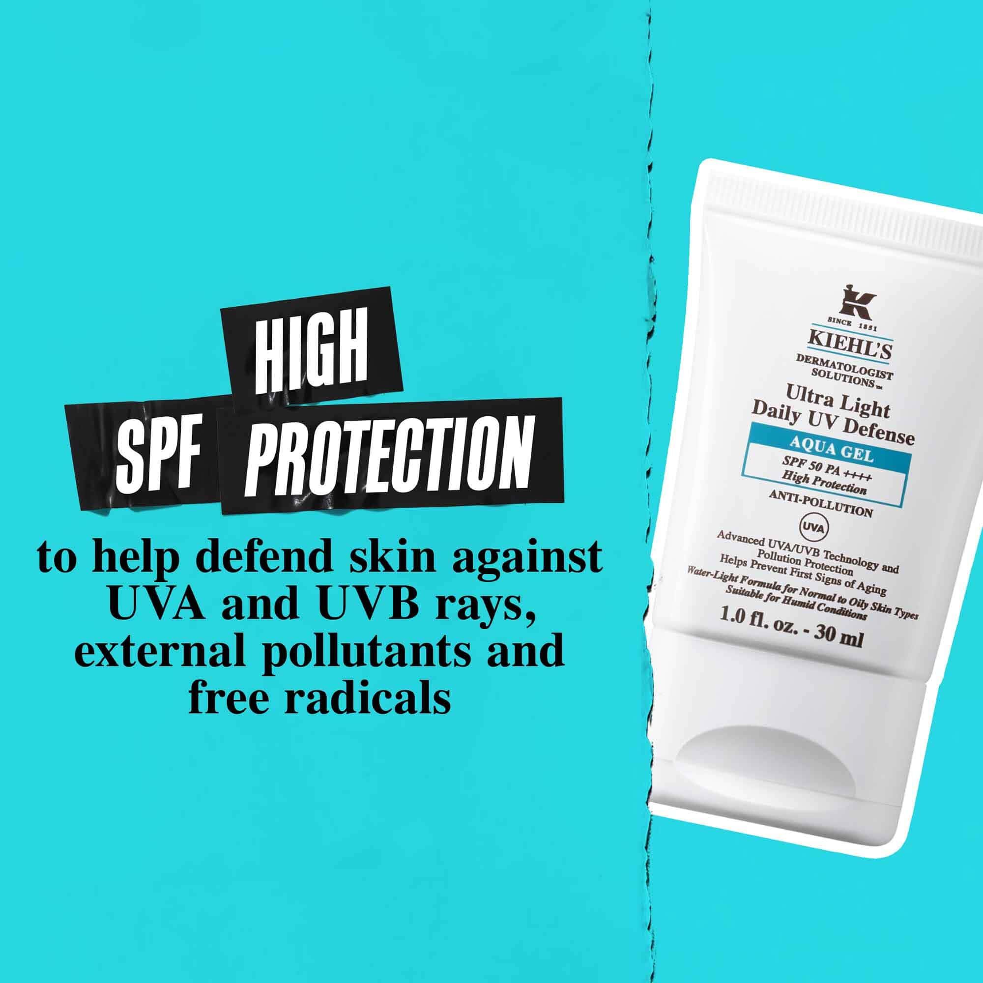 Eine Tube Ultra Light Daily UV Defense Aqua Gel vor blauem Hintergrund mit dem Text: „Hoher LSF-Schutz, um die Haut vor UVA- und UVB-Strahlen, externen Schadstoffen und freien Radikalen zu schutzen.“
