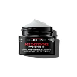 Un pot de 14 ml de soin yeux Kiehl's Age Defender avec une texture fouettee sur fond blanc.