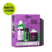 Kiehl's "Age-Less Experts" anti-aging skincare set, featuring a retinol serum, eye cream, and multi-corrective cream.