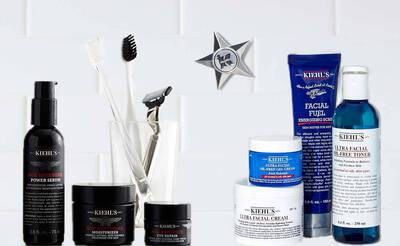 Kosmetikprodukte von Kiehl's: Seren, Cremes und Toner auf einem eleganten Hintergrund mit Badezimmerzubehor.