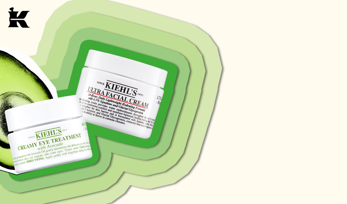 Kiehl's Creamy Eye Treatment with Avocado zusammen mit einer gratis Probe des Ultra Facial Cream, auf grunem Hintergrund mit Avocadohalfte