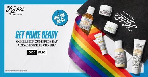Kiehl's Pride-Set mit Miniaturprodukten im Wert von CHF 42,-, darunter Ultra Facial Cream, Calendula Herbal-Extract Toner, Creme de Corps und Calendula Deep Cleansing Face Wash, dekoriert mit einem Regenbogenband auf einer Kiehl's Tasche
