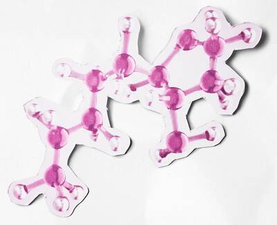 An abstract representation of a molecular structure featuring interconnected pink spheres and rods.