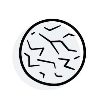 A simple illustration of a circular object with a cracked, uneven surface, resembling a dry or damaged planet or rock.