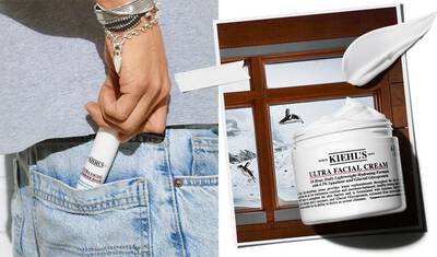 A person holding a tube of Kiehl's Ultra Facial Cream, with the product prominently displayed next to an image of the cream in a jar against a wintery background.