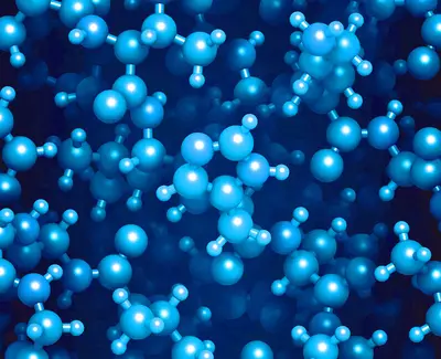 An abstract representation of blue molecular structures on a dark background, showcasing varying sizes and arrangements of spheres connected by lines, symbolizing chemical bonds.
