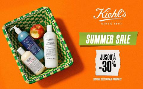 Kiehl's Summer Sale – Jusqu'a -30% sur une selection de produits, avec Creme de Corps, Facial Fuel et Amino Acid Conditioner dans un panier de pique-nique sur fond orange