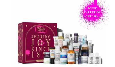 Kurzbeschreibung: Eine Kiehl's Einkaufstasche mit einem 2-Liter Nachfullpack und einer Originalgroße der Korperlotion "Creme de Corps".