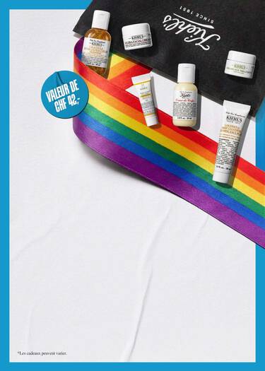 Coffret Pride Kiehl's d'une valeur de CHF 42,- comprenant des mini-produits : Ultra Facial Cream, Calendula Herbal-Extract Toner, Creme de Corps et Calendula Deep Cleansing Face Wash, decores d'un ruban arc-en-ciel sur un sac Kiehl's
